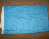Daisy Kingdom Raggedy Ann and Andy Blue Fabric with Red Hearts and all over White Printed Words