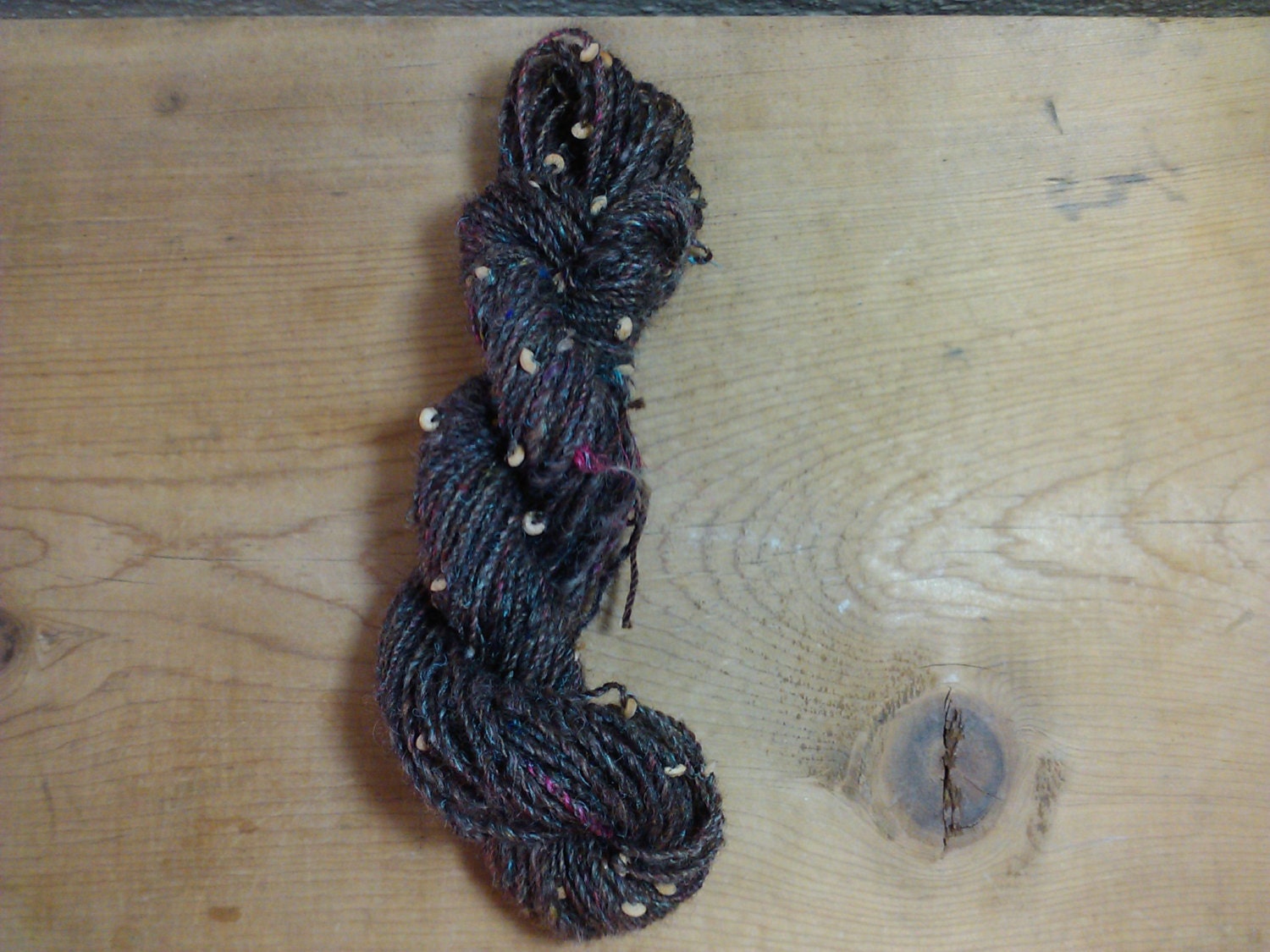 Handspun Border Leister silk mohair blend yarn with wooden beads
