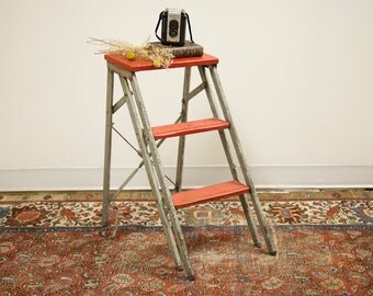 Red and Silver Industrial Step Stool