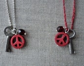 red peace sign vintage skeleton key necklace