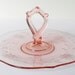 Vintage pink depression glass handled sandwich platter with etched flowers