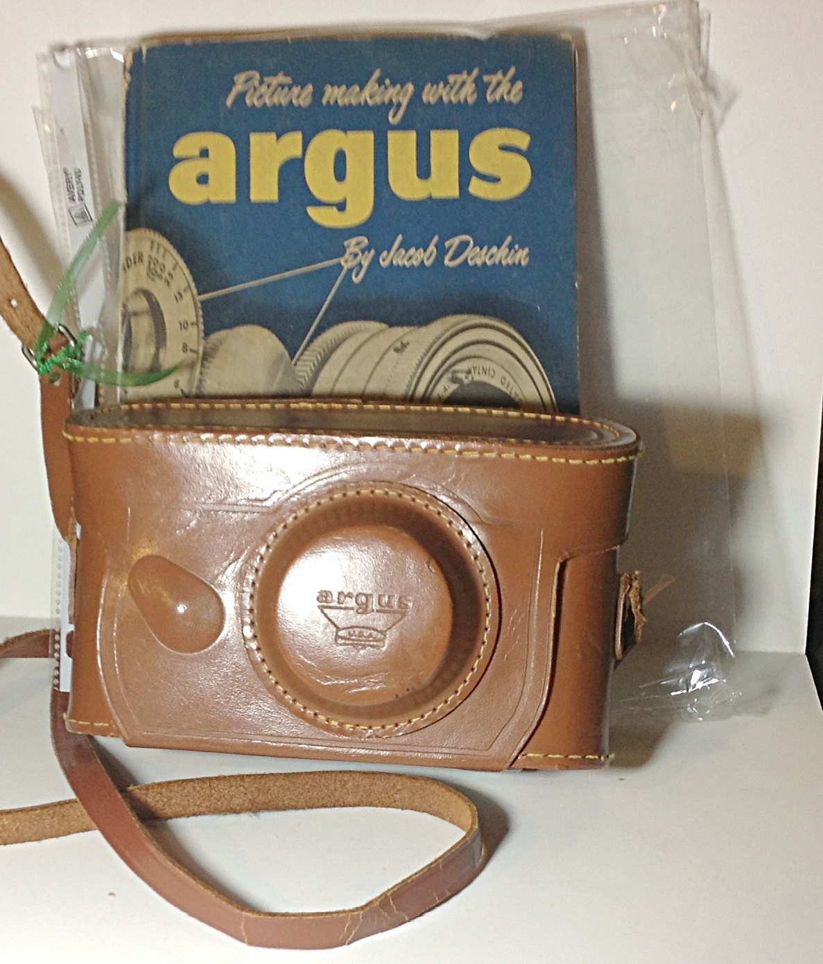 Argus vintage camera, leather case, and hardback instruction manual