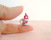Tiny love elf in a mug
