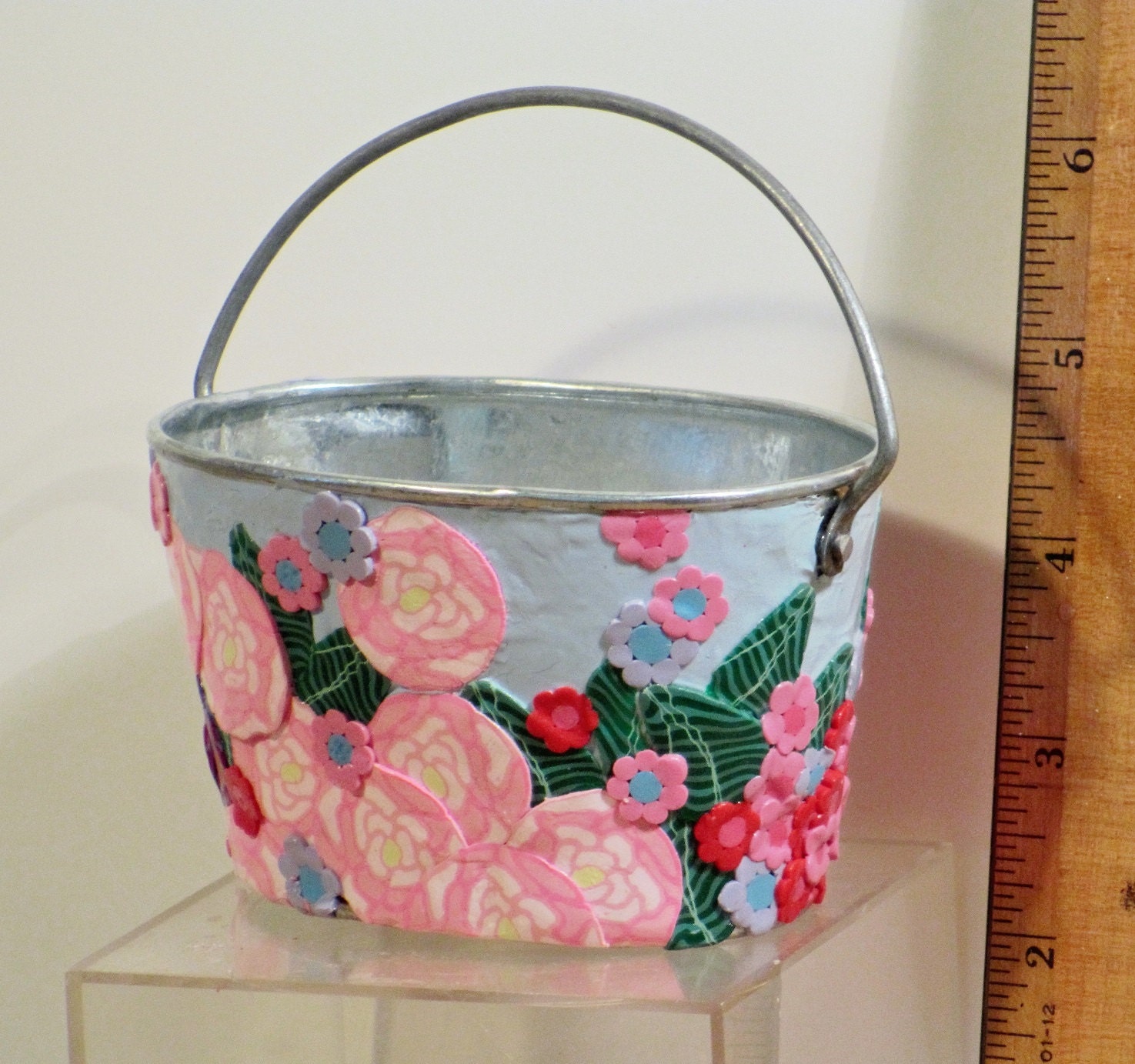Pink and blue tin flower bucket