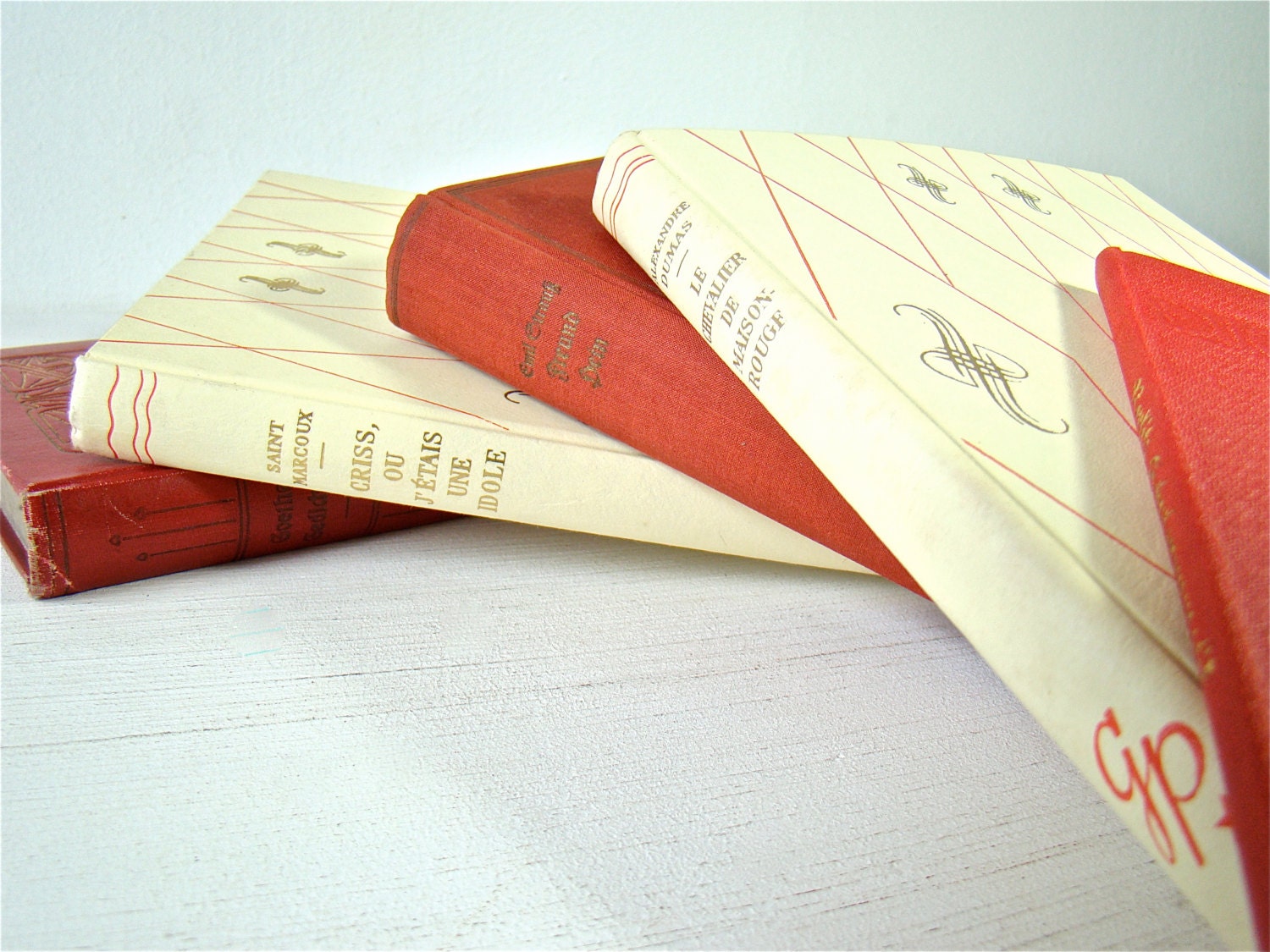 peppermint swirl book stack, vintage french and german books, white and red books, candy stripe home decor