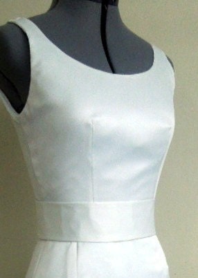 A beautifully elegant off-white 50s inspired Pencil cut skirt wedding dress