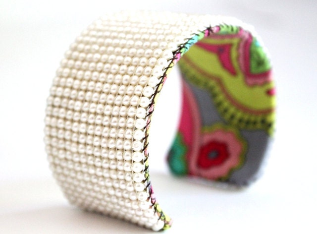 loom woven faux pearl cuff with bright floral backing