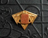 Art Deco Pin. Goldstone. Late Nouveau Early Deco.