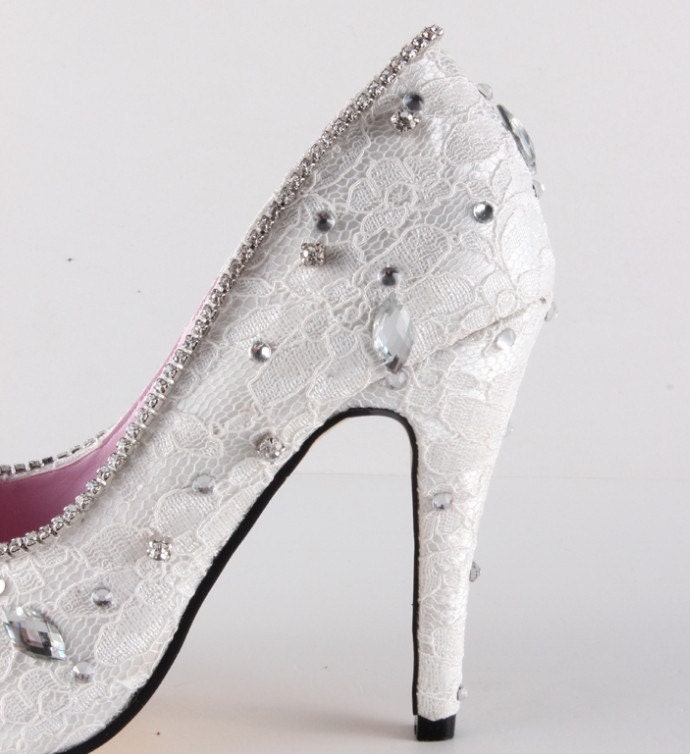 Elegant white lace and crystals wedding shoes