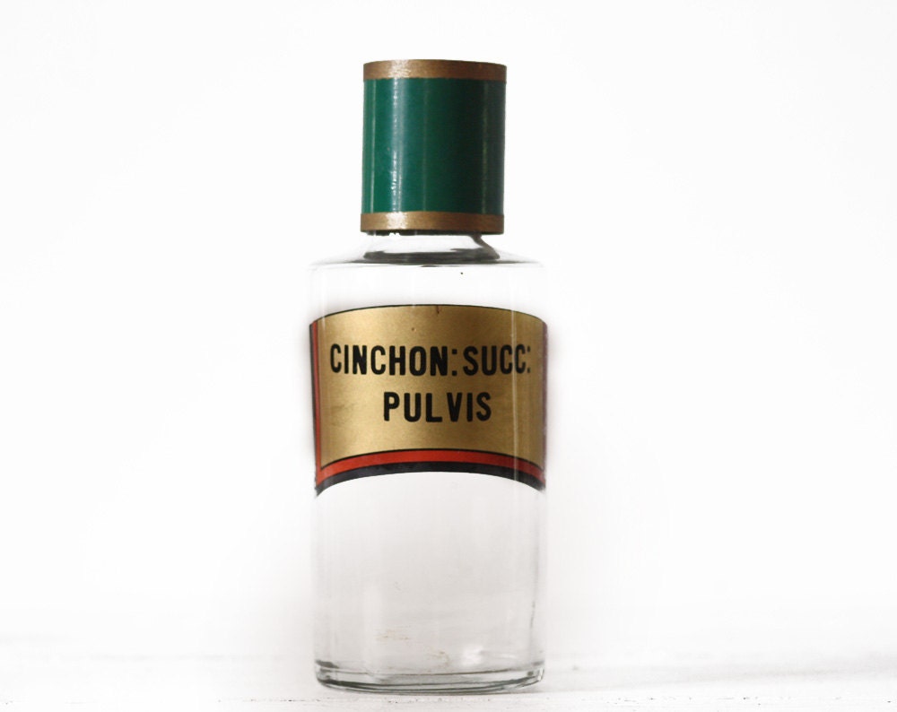 Antique French APOTHECARY BOTTLE with its golden labels and its green and gold metal top