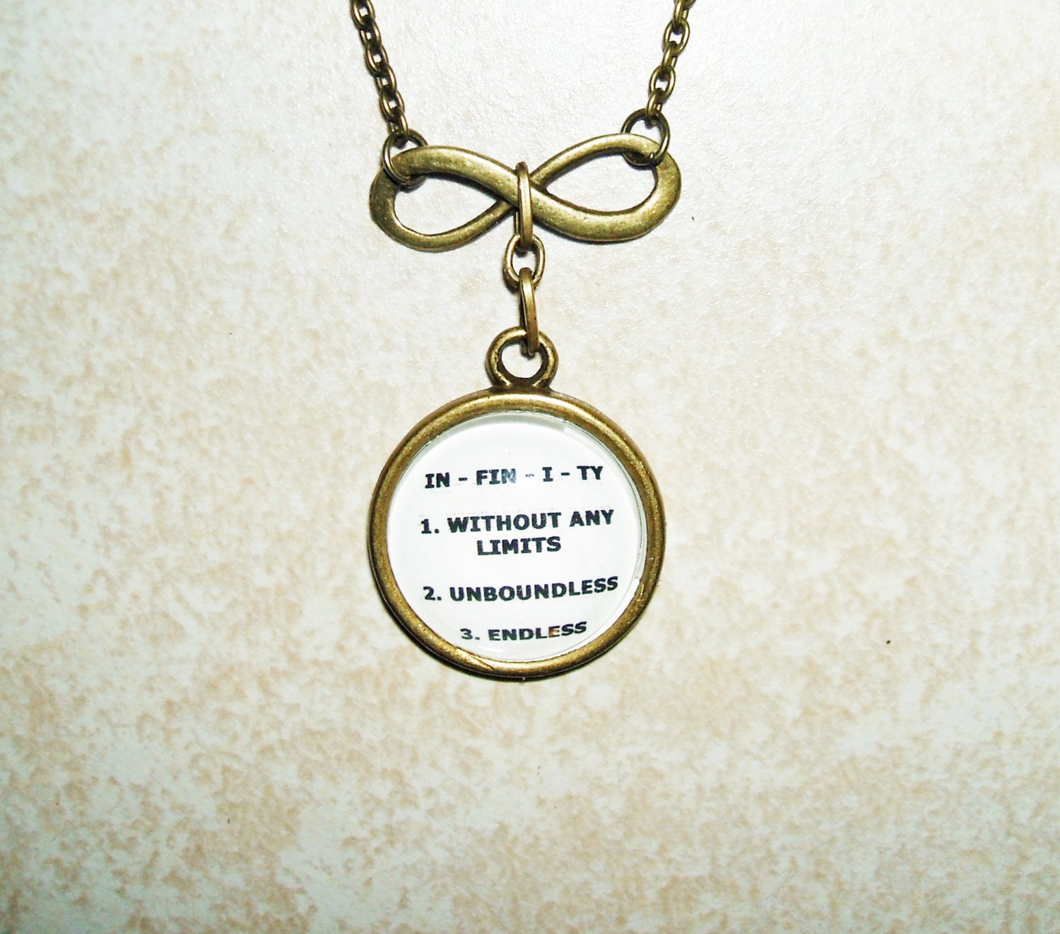 INFINITY Necklace Antiqued Bronze Symbol Endless and Without Limits Original Design Word Definition Pendant