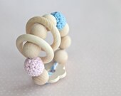 Flower toy. Teething toy with crochet wooden beads and 2 wooden rings. Blue and soft pink wooden beads rattle.