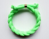the braid bracelet - handmade with neon fabric and a gold stainless steel bead