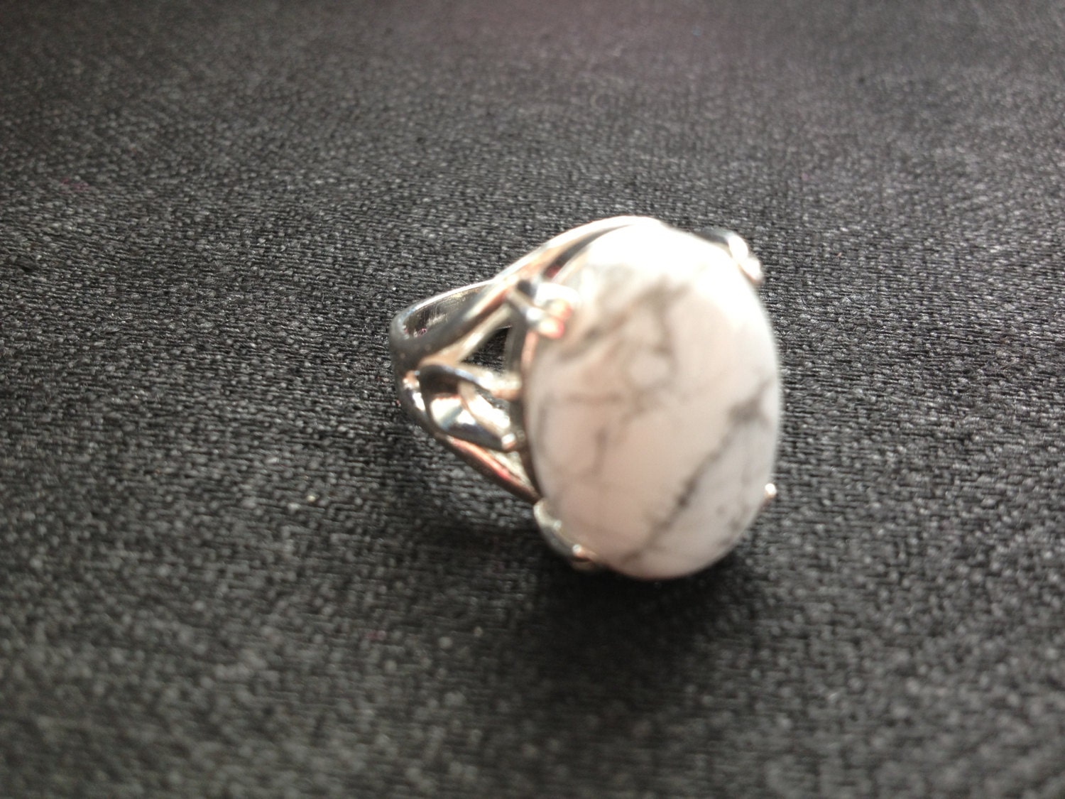 White howlite cabochon ring set in sterling silver 925.  Sizes 6,7, and 8.