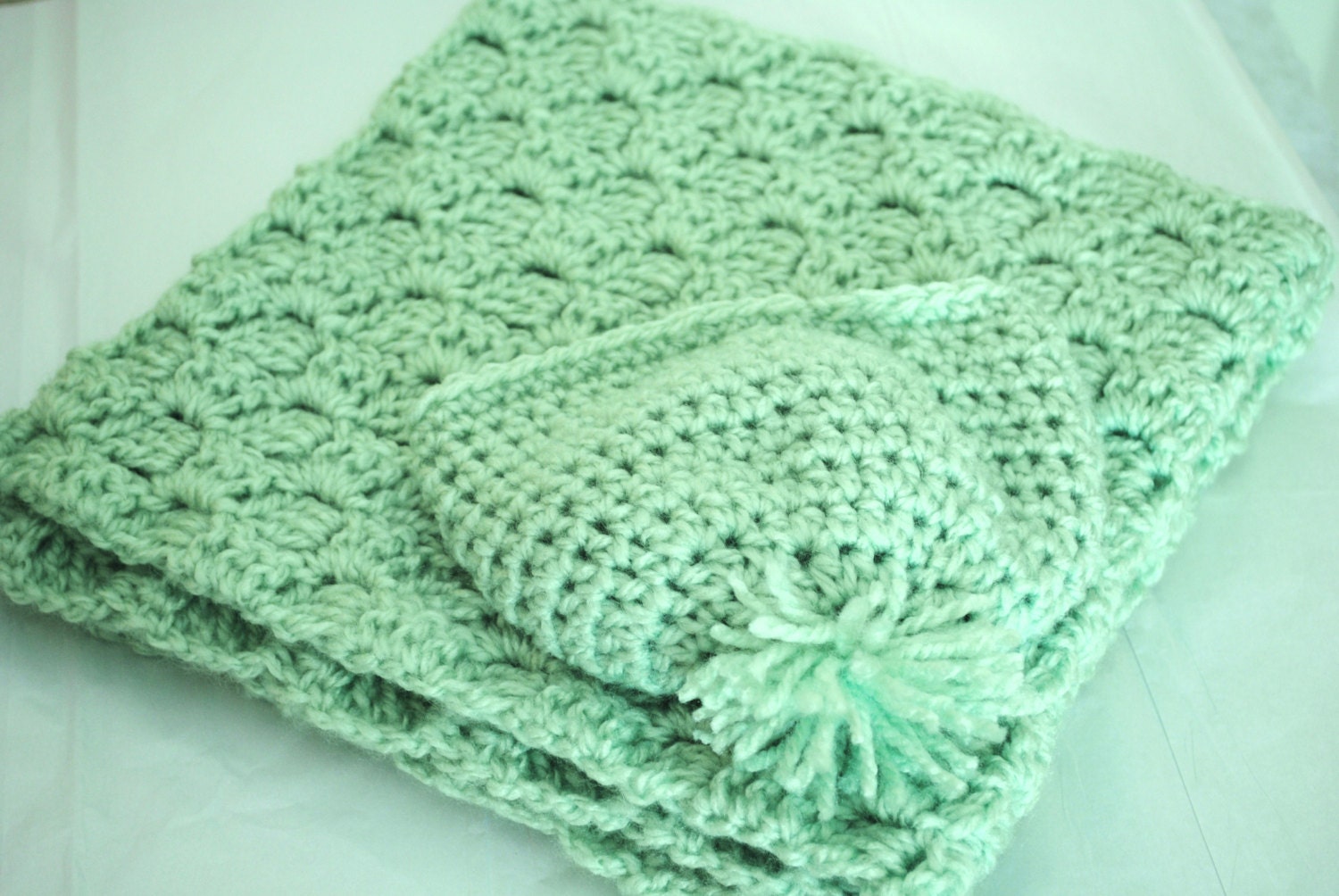 mint green crochet baby blanket with matching hat