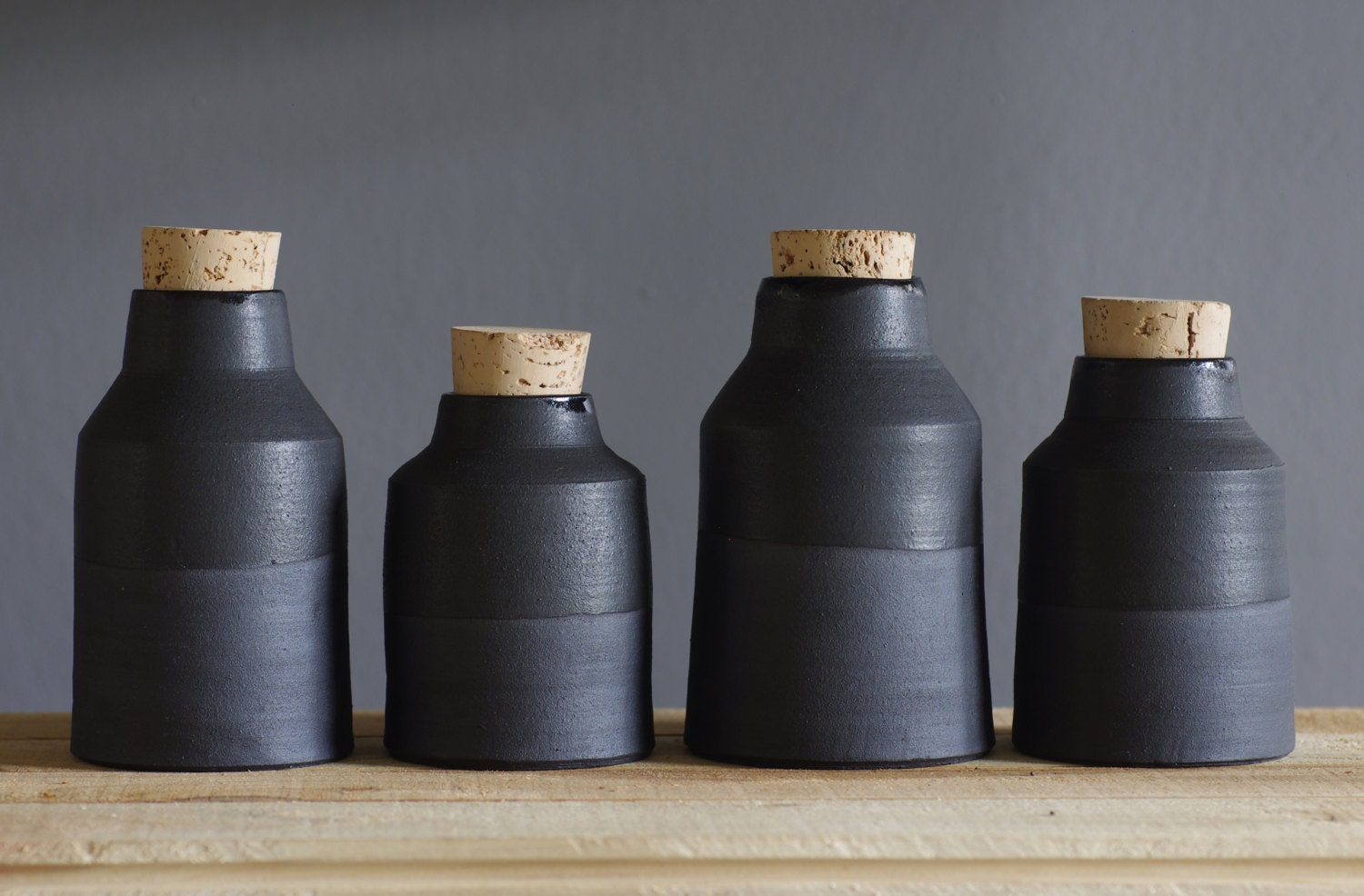 one black vase. matte black stoneware bottle / vase. modern minimal pottery ceramic