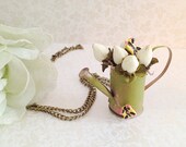 Miniature Watering Can Necklace. Retro. Vintage Style. Butterfly. Rustic. Metal. Green. Long Necklace. Whimsical. Gardening. Spring. Flower