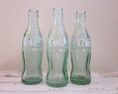 set of 3 glass coca cola bottles