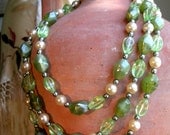 Peridot green 3 strand necklace with filigree clasp. Spring fresh vintage bead jewellery from Peacock and Rose.