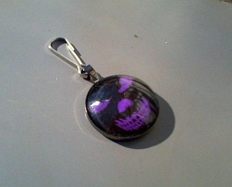Scary goblin face zipper pull, purple in gunmetal black