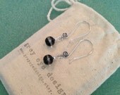 Unique Silver Spiral Earrings with a Black Dangle Bead with Translucent Center Stripe