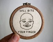 Will Bite Your Finger Hobo Sign -- Modern cross stitch hobo signs for a contemporary (digital) world, Charlie Bit My Finger inspired