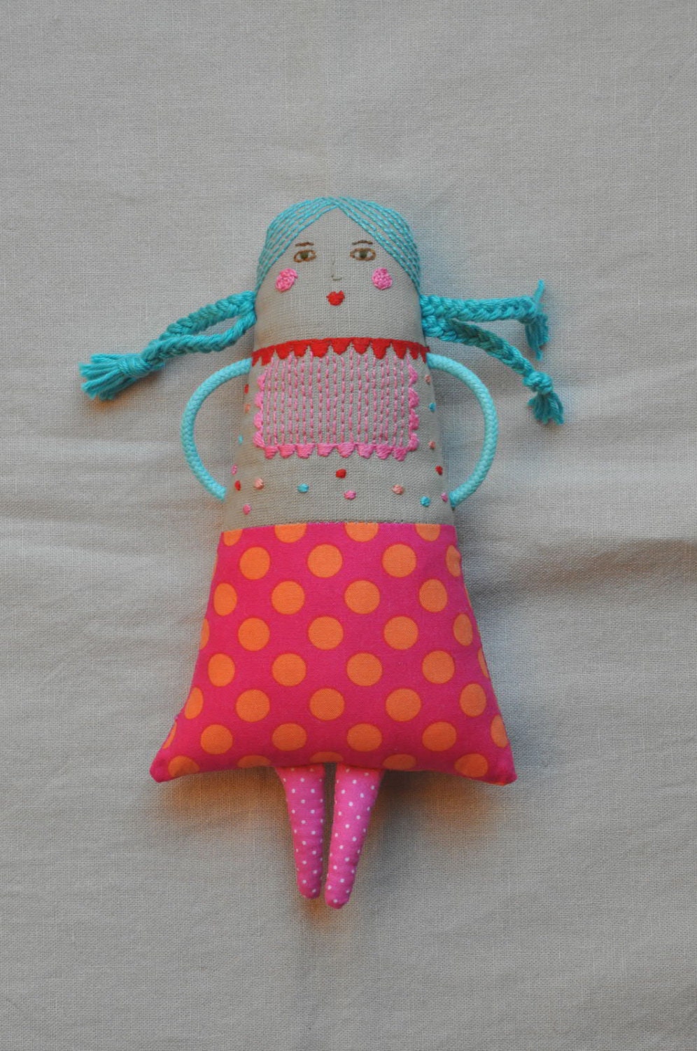 Handmade doll with embroidered face and body