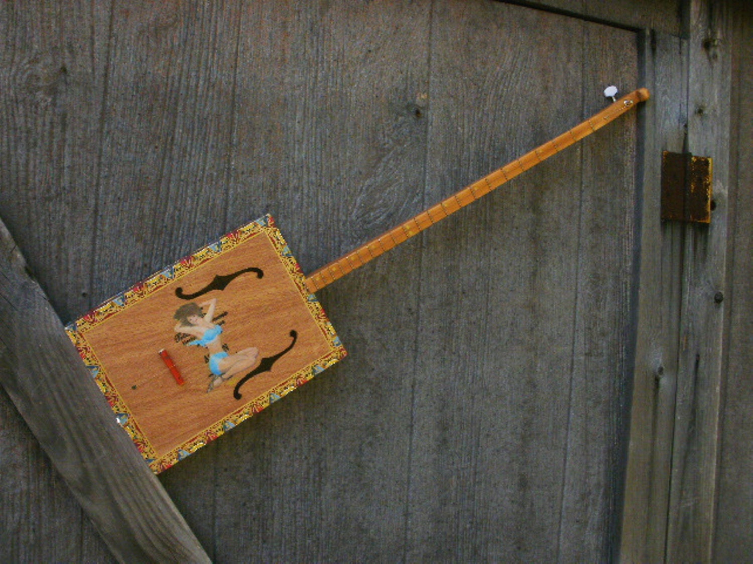 CIGAR BOX GUITAR delta blues Diddley Bow with Pinup girl