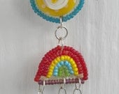 Sun and Rainbow Brooch.