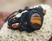 bracelet with tiger eye, brass and glass beads