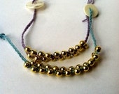 2 Pastel Gold Beaded Bracelets, Stackable Bracelets, Gift for Teenage Girls, Blue Pastel and Purple Pastel Hemp Chord
