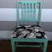 Distressed mint green chair with black and white flower seat