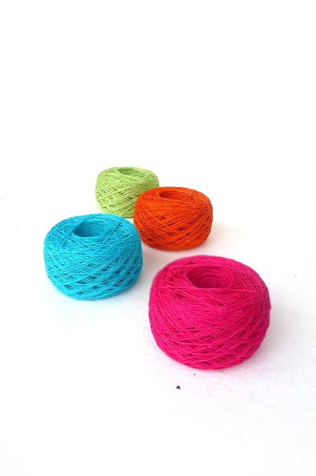 Bright mix of linen yarns for Spring knitting projects - neon hot pink turquoise orange green