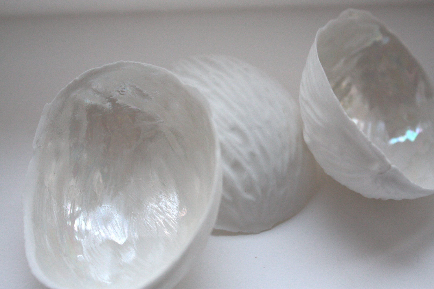 Big walnut shells made from stoneware fine bone china with a mother of pearl interior