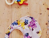 Baby bib - girls taupe cotton with mustard yellow and purple floral fabric on towelling backing