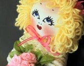 The Playful Mop Doll