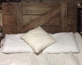 Reclaimed barn door headboard