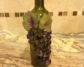 Wine bottle with lights and Grapes