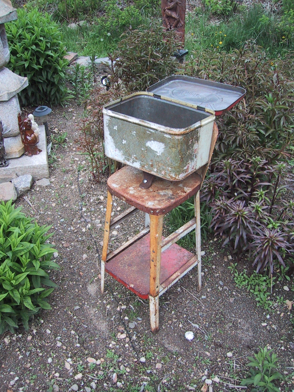 Repurposed Salvaged Planter using a vintage rusty metal stool and vintage breadbox