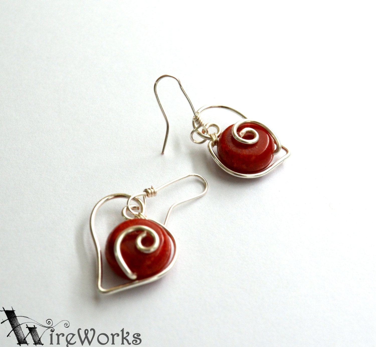 Be My Valentine earrings. Silver plated coral heart shaped earrings - SuggestiveWireWorks