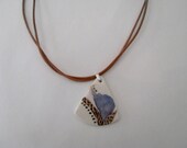 African Inspiration ,Triangular  Shape, Brown suede leather ,White Porcelain Necklace & Sterling Silver Clasp, handmade, and one of a kind