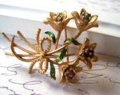 Vintage Gold Tone Flowers Rhinestone Brooch Signed MYLU
