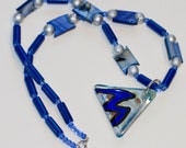 Mountain Skyway: Unique blue and silver necklace with lampwork pendant