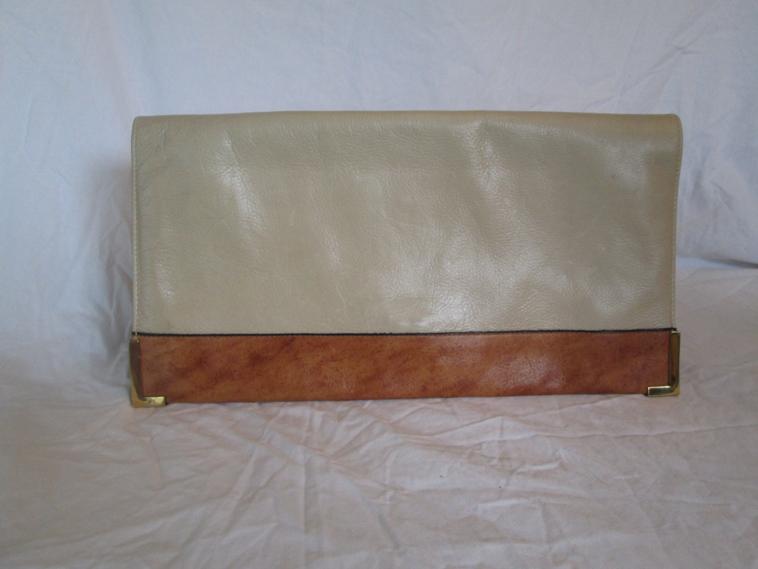 vintage goldpfiel boutique tan leather clutch with gold corner detail luxury high fashion
