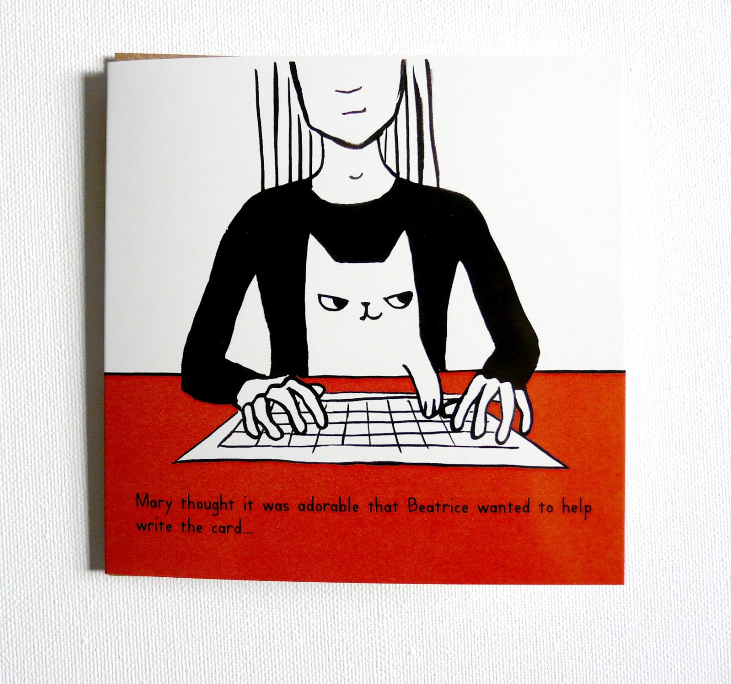 Cat helping to write the card. Funny illustrated birthday cat card.