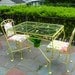 1950's vintage, iron, rectangular glass top garden table and (2) newly upholstered chairs set. Yellow.