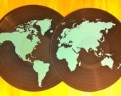 World Record -- 2 overlapping re-purposed records with turquoise screenprint of the world.