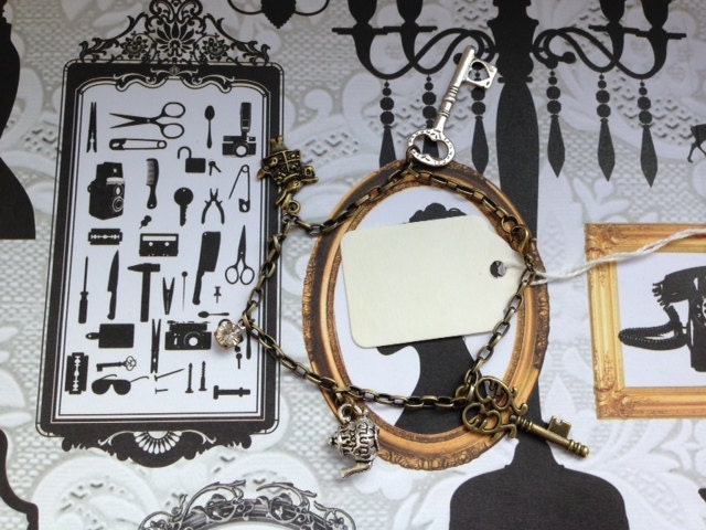 Alice in Wonderland charm bracelet in antique brass and silver, steampunk design