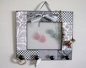 Custom designed jewelry holder to organize all your jewelry so it's on display to accessorize your next outfit.