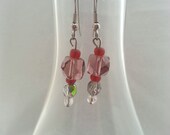 Pretty little drop earrings. Purple, pink, and iridescent. Simple elegance. 1 1/2" length.